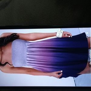 No tag, but it's brand is Zyyfly, one size fits all, grey purple blue